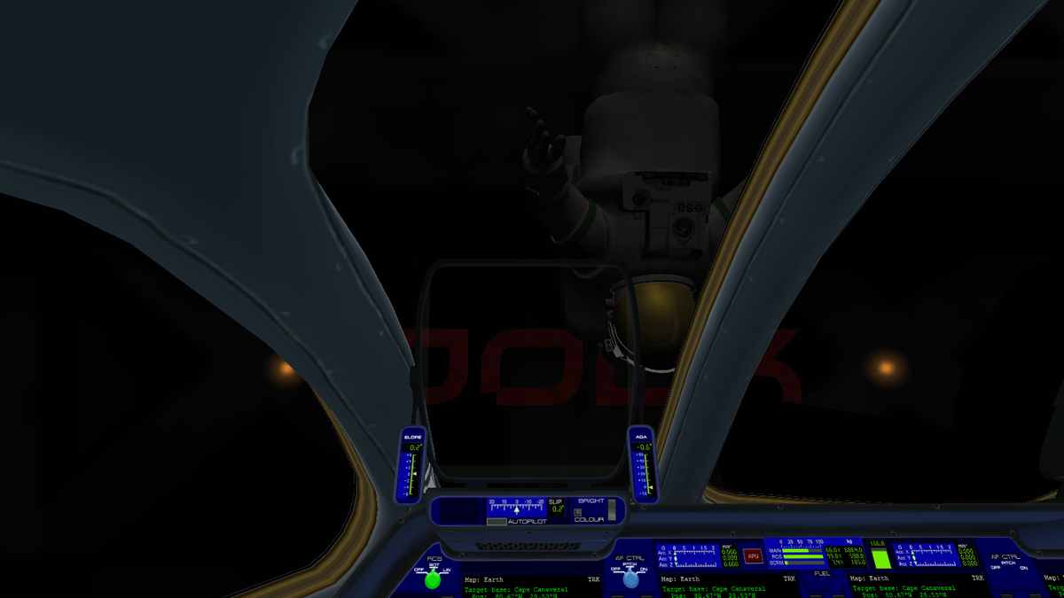 Engineer Hill Lewis IV looking like an orbital roadside window washer, sounds the Enterprise in Armstrong's shuttle bay.