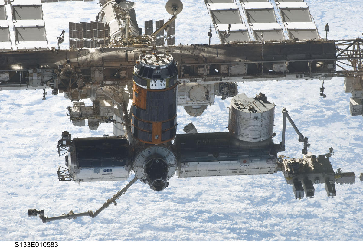 STS-133 view of ISS at Fly-around